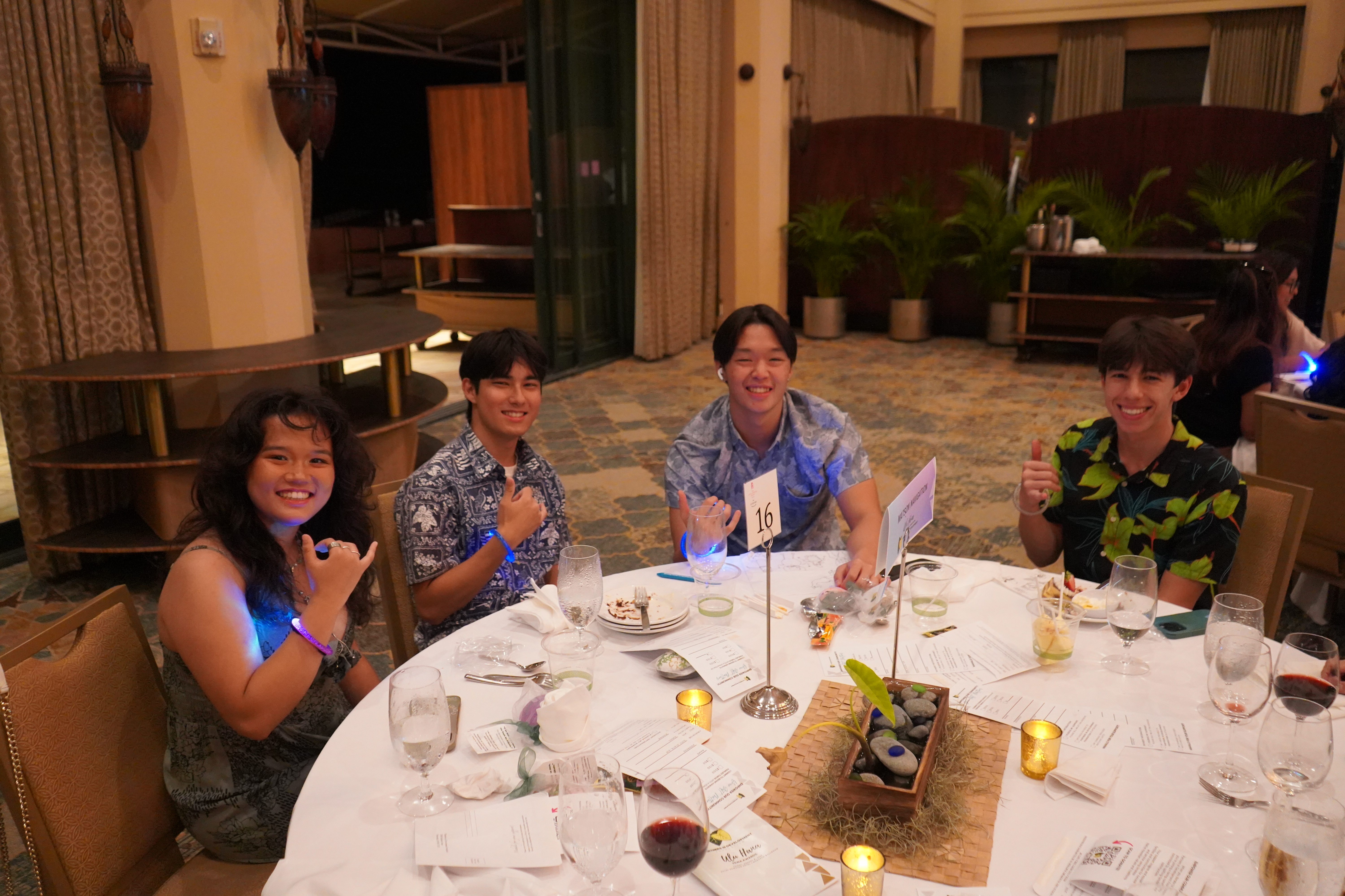 Young donors smiling with their light-up bracelets, symbolizing their donation.