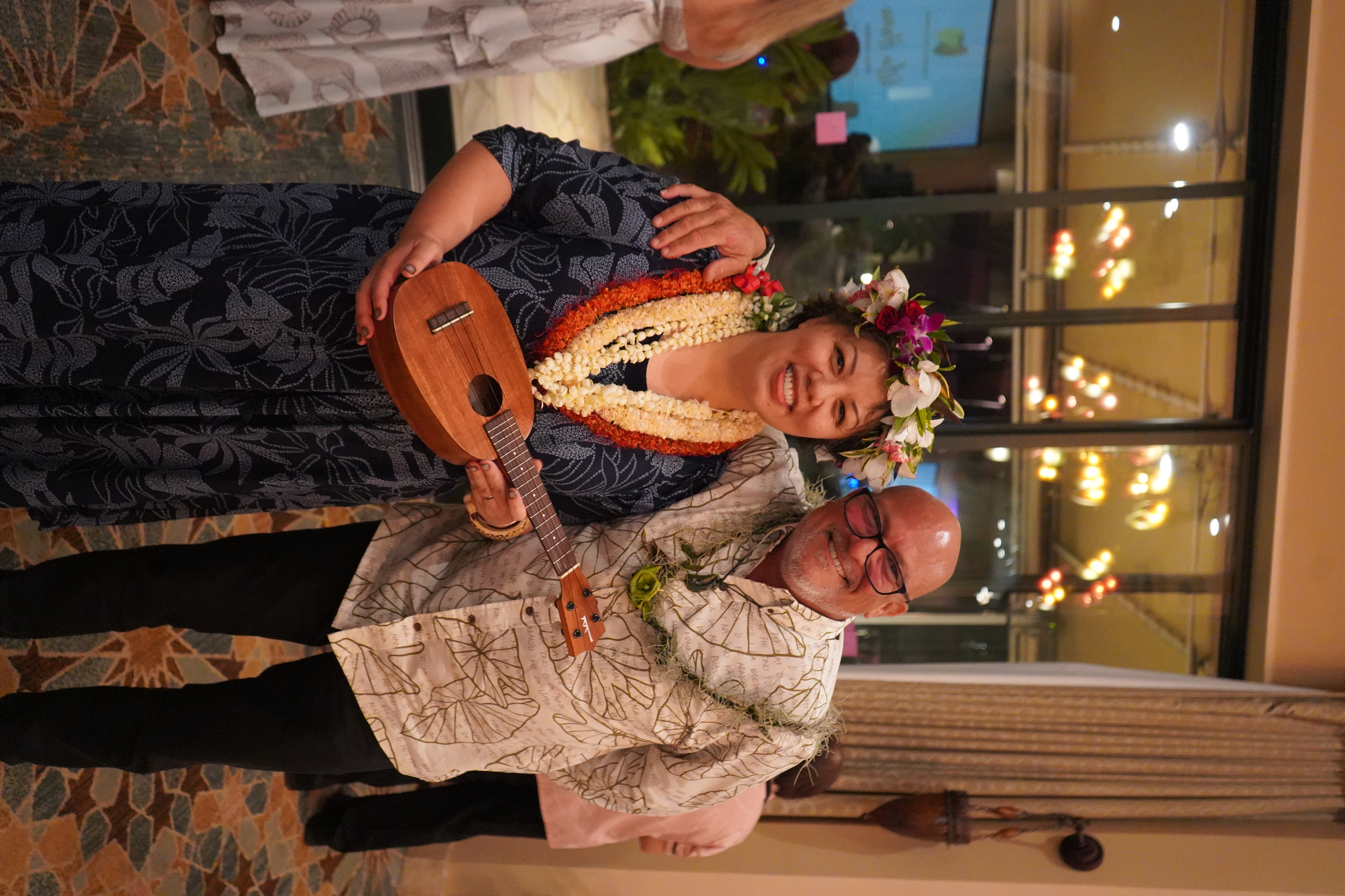 Auction winner smiling with her Kamaka Ukulele.